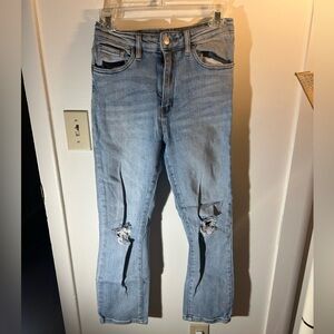 Straight leg light wash ripped jeans